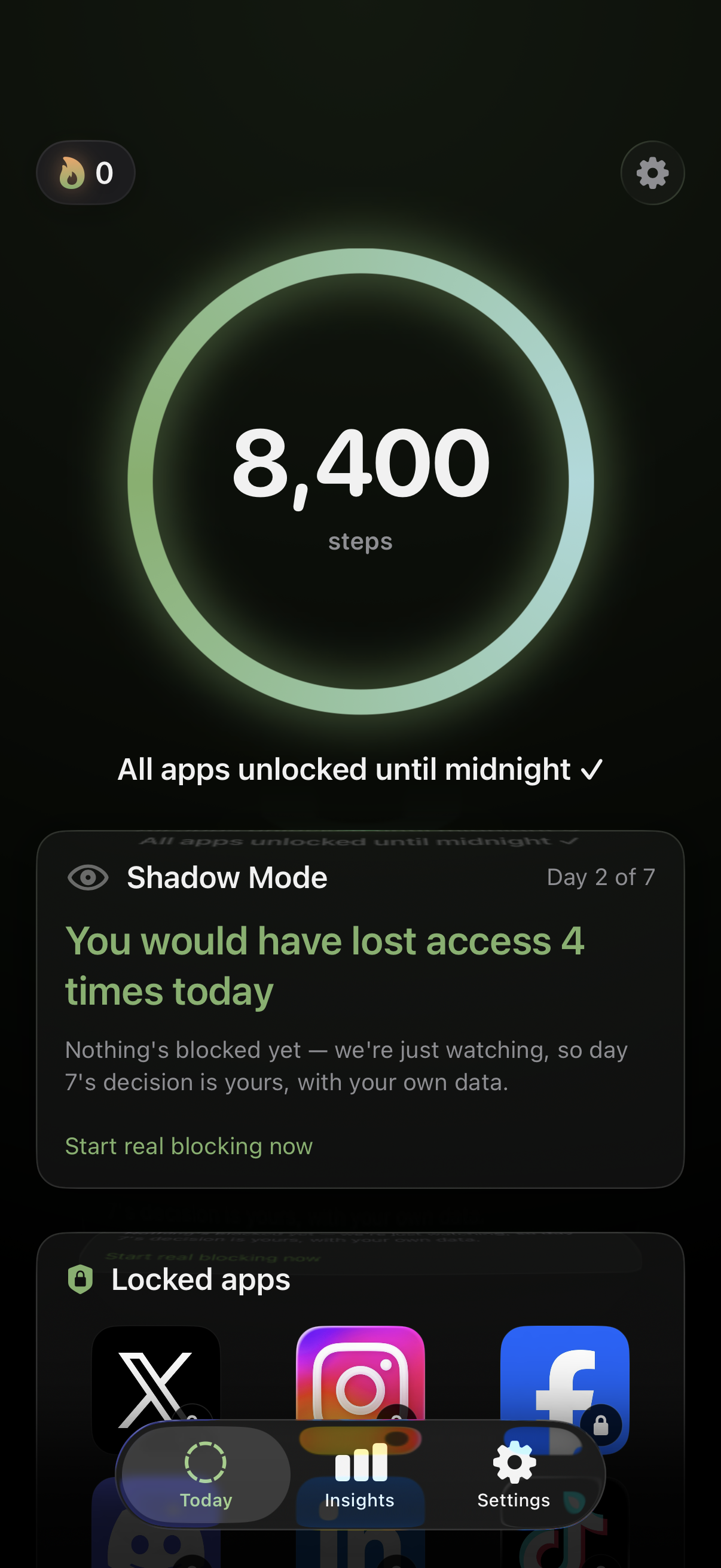 EarnLock home screen on iPhone after the goal is met — full green ring at 8,400 steps with